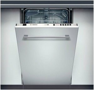 Esto es un lavavajillas integrado. Cuando está cerrado, es invisible pues su frontal es como una puerta más de un armario de cocina.